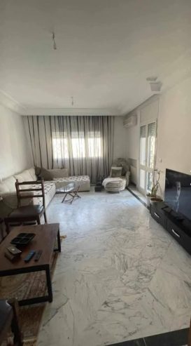 Appartement-S3-Cite-Ennasr-2-390000-dinars-Salon