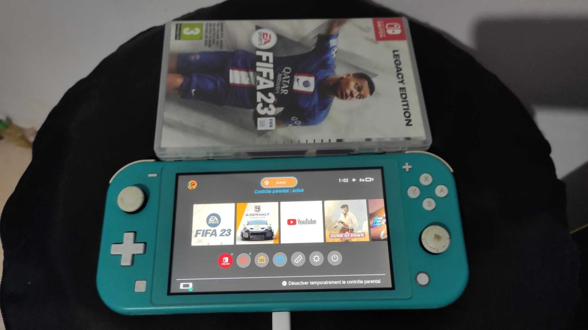 Pack-Nintendo-Switch-Lite-avec-FIFA-23-et-Pochette-Occasion-320-DT