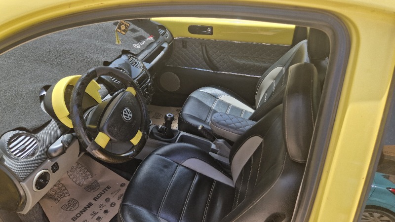 Interieur-Volkswagen-Beetle-Diesel-2003-–-Climatisation-ABS