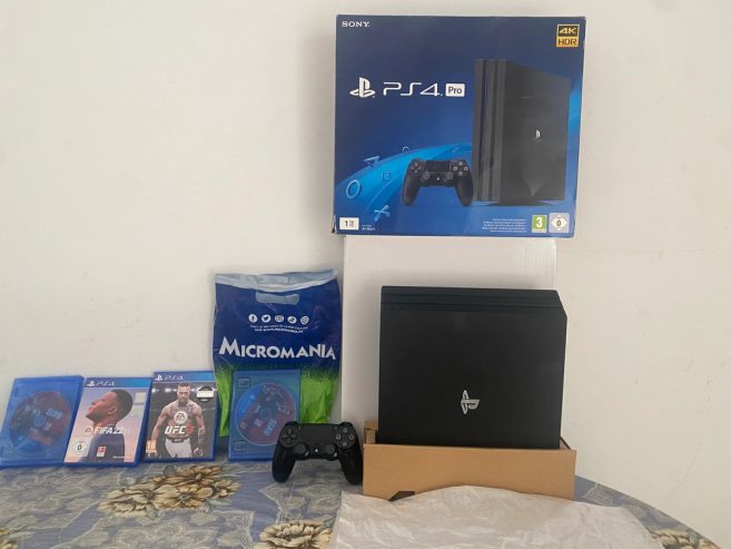 Pack-PS4-Pro-avec-FIFA-22-UFC-et-Red-Dead-Redemption-2-1