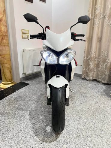 arrow-pot-triumph-moto