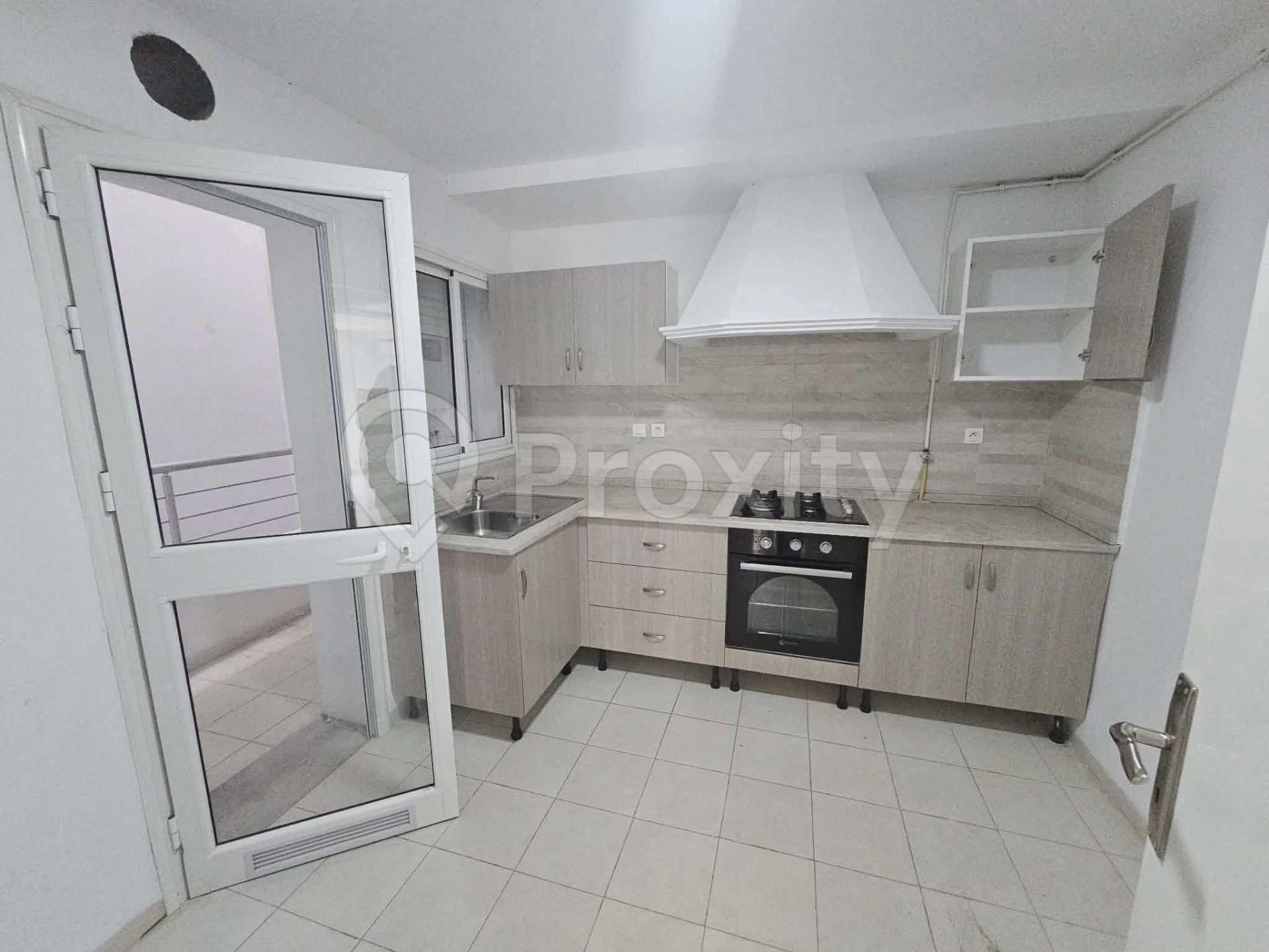 appartement-s2-a-louer-riadh-el-andalous-salon-climatise