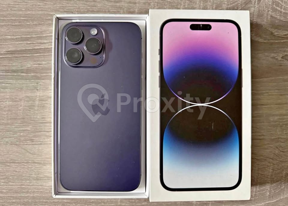 iPhone 14 Pro Max violet à vendre à Tunis – batterie 94 %, avec boîte, chargeur et caches MagSafe