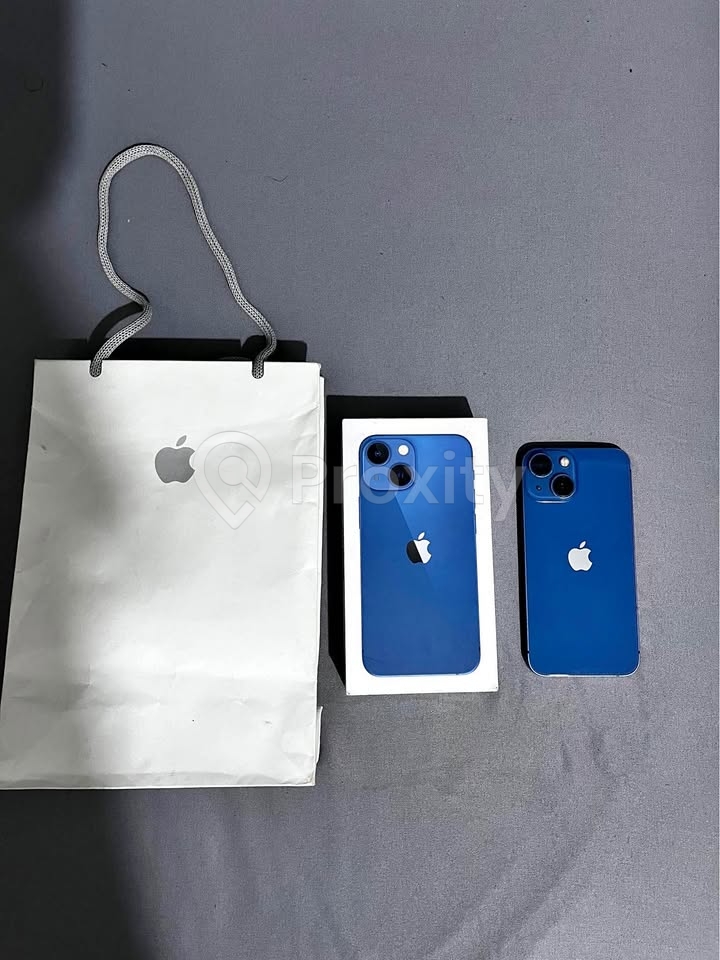 Phone 13 mini bleu 256 Go à vendre à Tunis – bon état, importé des États-Unis