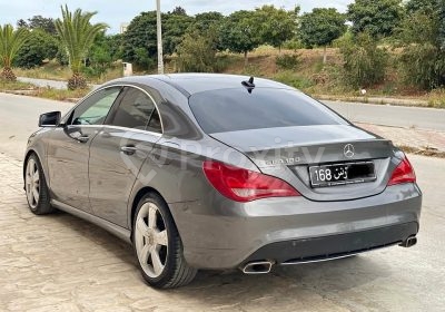 Mercedes CLA 180 grise modèle 2014 vue arrière à La Soukra