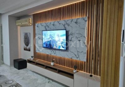Salon d’un appartement S+3 haut standing à vendre à Cité Ennasr 2