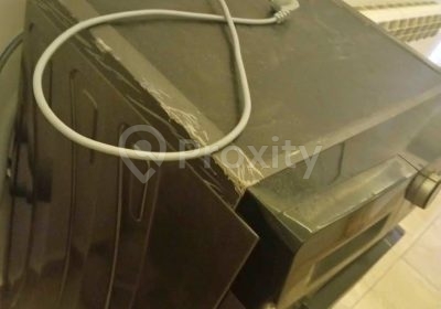 Vue supérieure et latérale de la machine à laver Brandt 7 kg à Hammam Lif