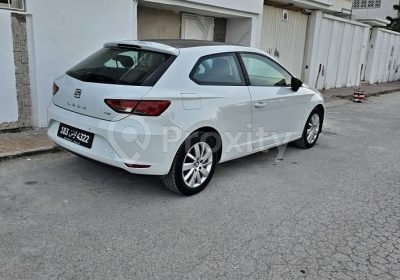 Seat Leon SC 2016 blanche d’occasion vue arrière droite à La Soukra