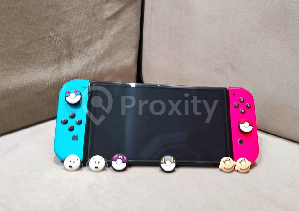 Nintendo Switch OLED avec FC 24 et Red Dead Redemption à La Soukra – 900 DT