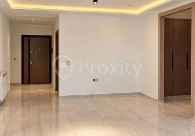 Salon lumineux d’un appartement S+2 neuf à louer à Chotrana 2
