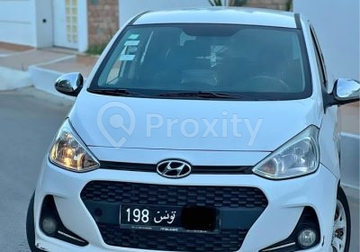 Hyundai Grand i10 2017 blanche d’occasion vue de face à Ksar Hellal